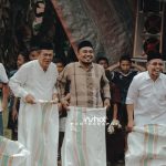 Bupati Bolmut Sirajudin Lasena ikut lomba lari karung dalam acara Halal Bihalal di Desa Bohabak I.