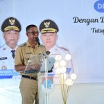 Bupati Boltim Oskar Manoppo membuka kegiatan pencanangan Desa Cantik di Desa Togid, didampingi perwakilan BPS dan perangkat desa, Selasa 27 Mei 2025.