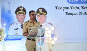 Bupati Boltim Oskar Manoppo membuka kegiatan pencanangan Desa Cantik di Desa Togid, didampingi perwakilan BPS dan perangkat desa, Selasa 27 Mei 2025.