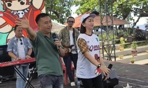 Wakil Bupati Boltim Argo V. Sumaiku bersama peserta dalam kegiatan Likupang Funwalk 2025 di Minahasa Utara.