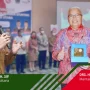 Aditya Pontoh, Wakil Bupati Bolaang Mongondow Utara, memaparkan strategi percepatan penurunan stunting, sementara Drs. Hi. Amin Lasena, MAP menerima penghargaan dalam acara yang berlangsung di Manado.
