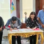 Bupati Bolaang Mongondow Utara, Dr. Sirajudin Lasena, S.E., M.Ec.Dev, menandatangani perjanjian kerja sama jaminan kesehatan bersama BPJS Kesehatan Cabang Tondano, disaksikan jajaran pemerintah daerah dan pimpinan OPD terkait.