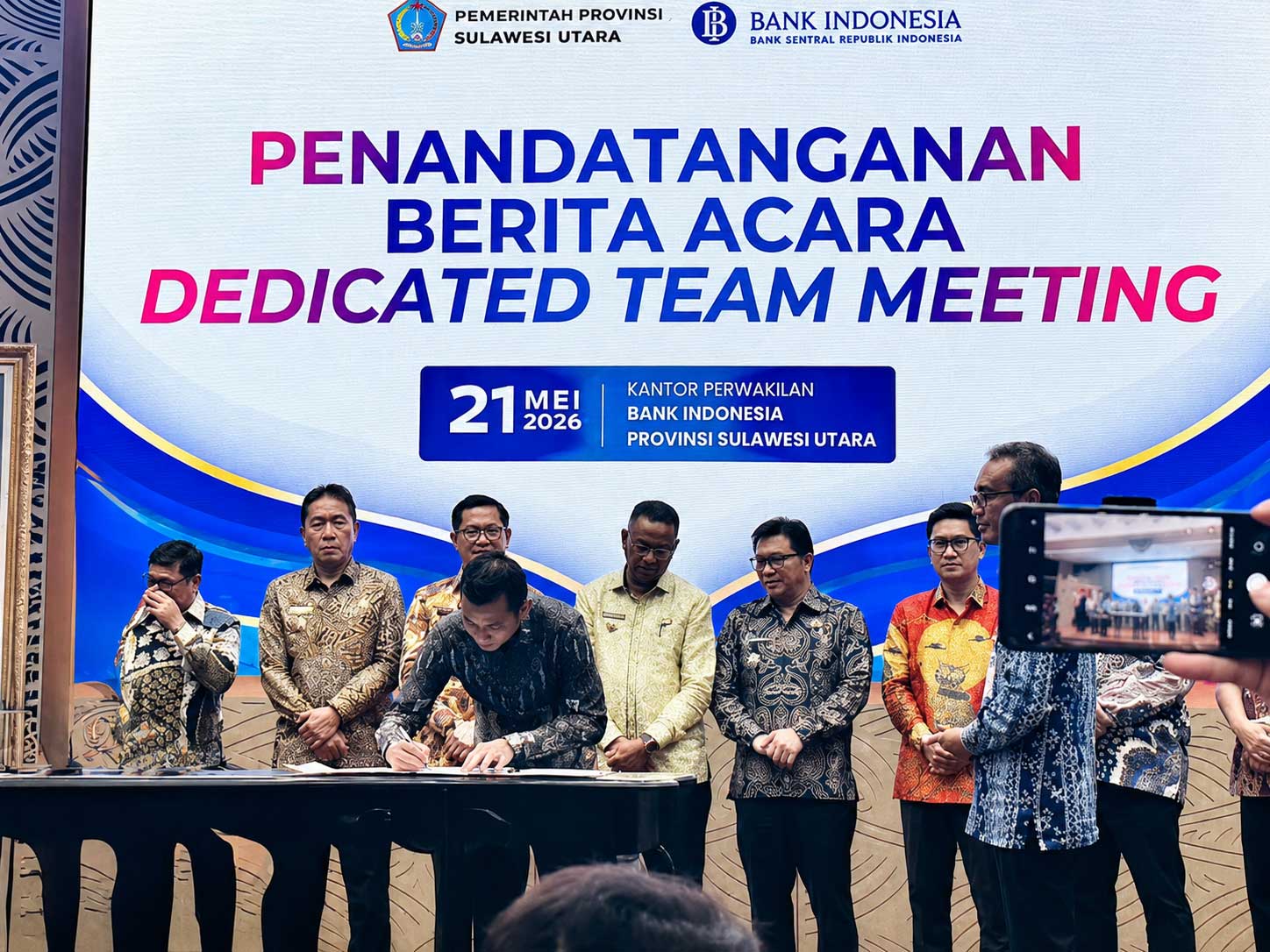 Penandatanganan berita acara DTM RIRU Sulut 2026 di Kantor Bank Indonesia Sulawesi Utara yang dihadiri Wakil Bupati Boltara Mohammad Aditya Pontoh.